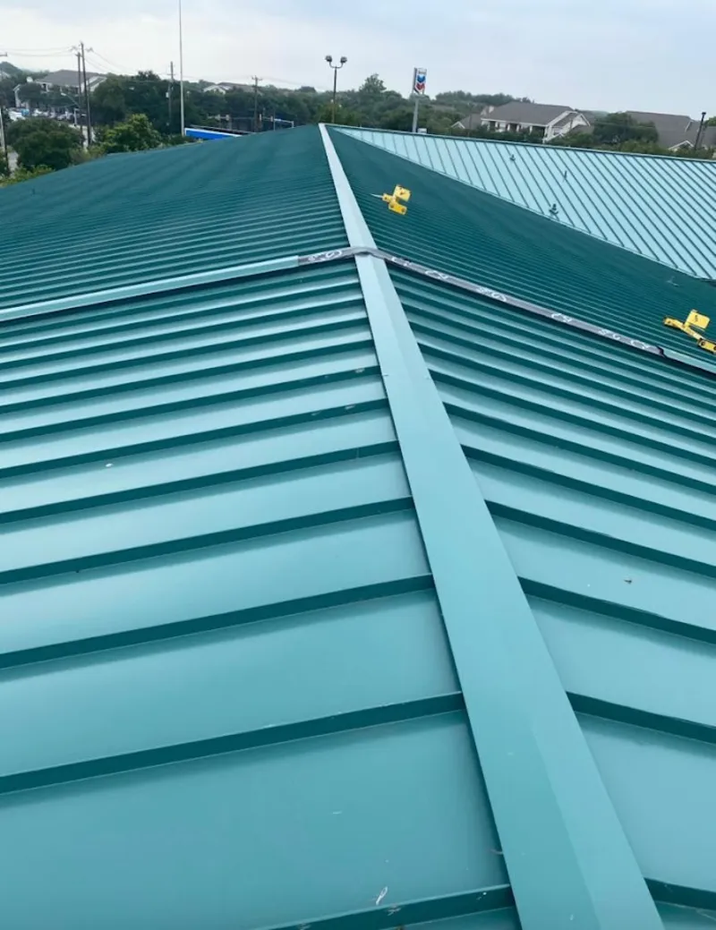 Green commercial metal roof ridge and valley for Metal Roof Repair in Fairview Heights
