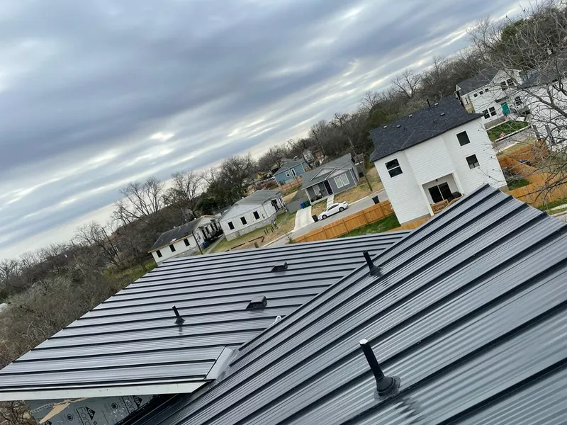 Standing seam metal roof panels with vents for Skylight Repair in Fairview Heights